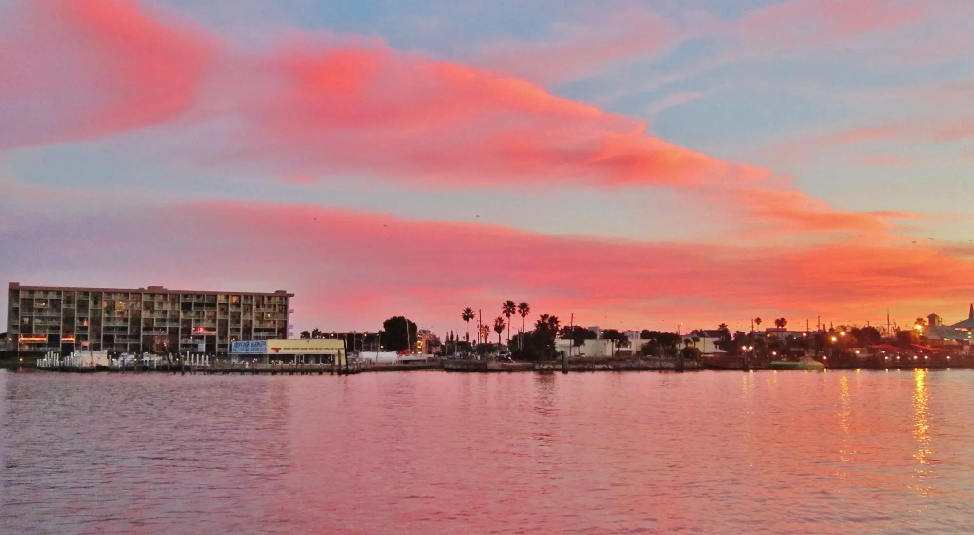 Pink sunset clouds over John's Pass and the Madeira Beach waterfront